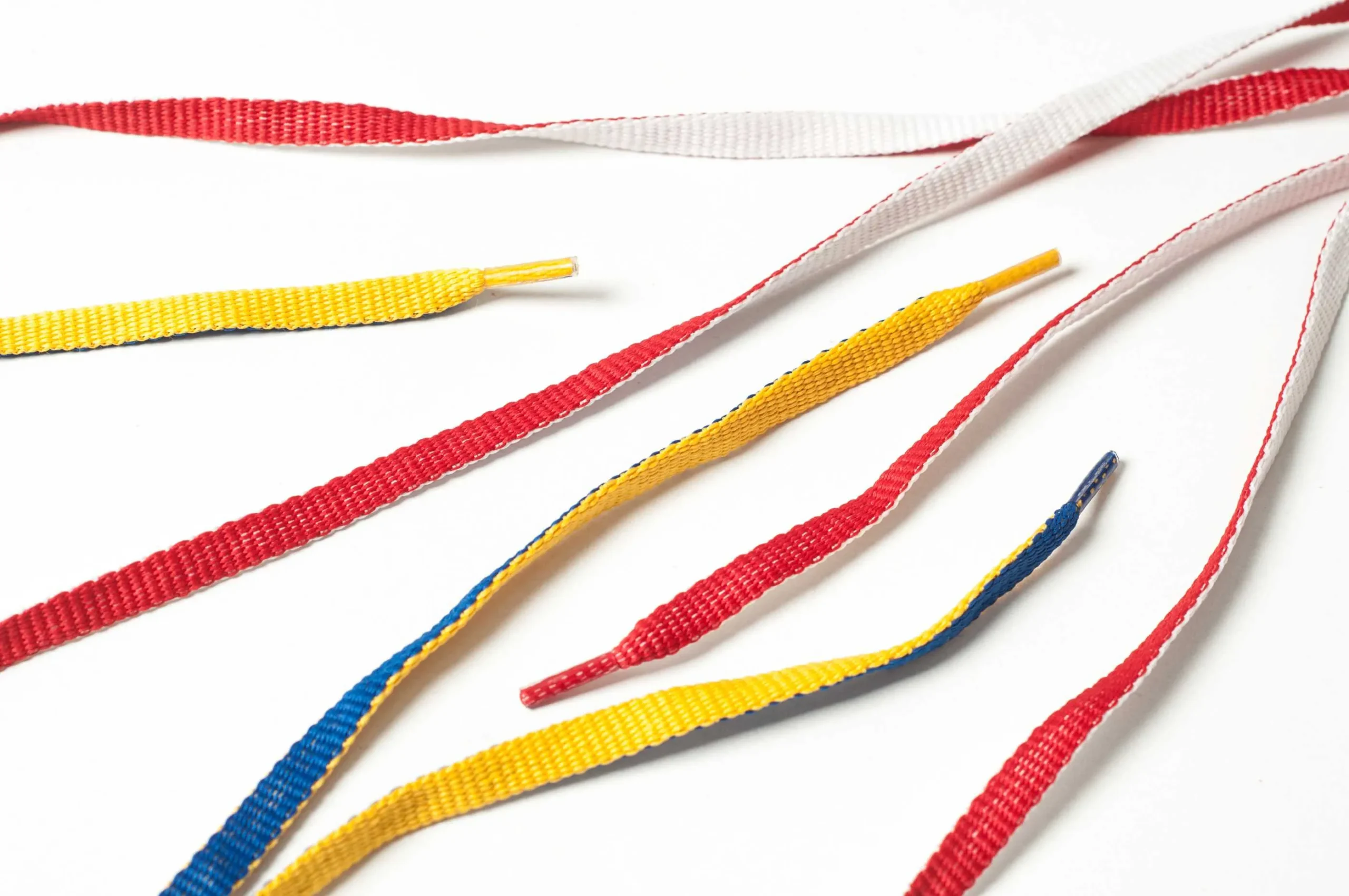 Cordones poliester chatos doble faz