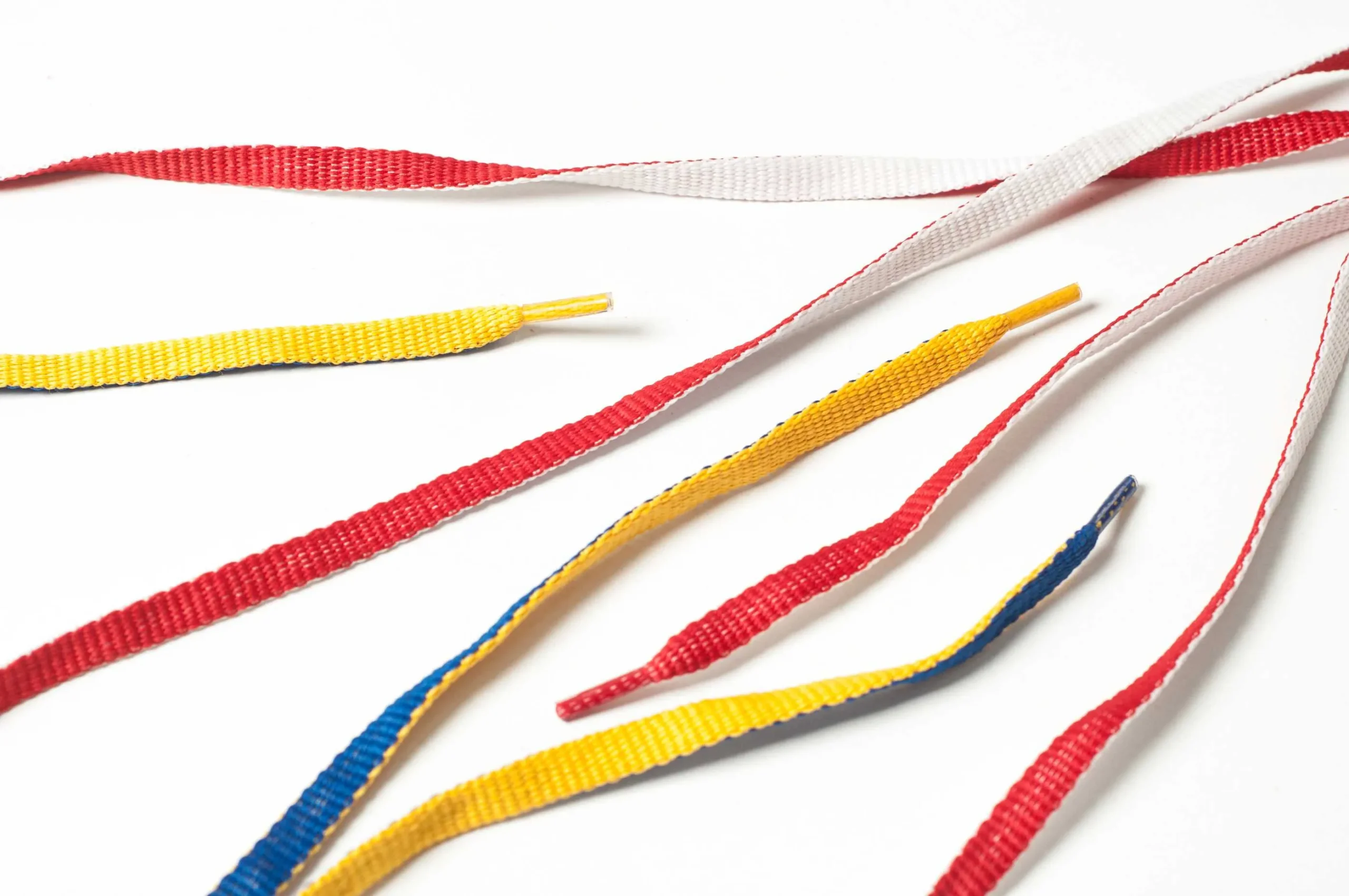 Cordones poliester chatos doble faz